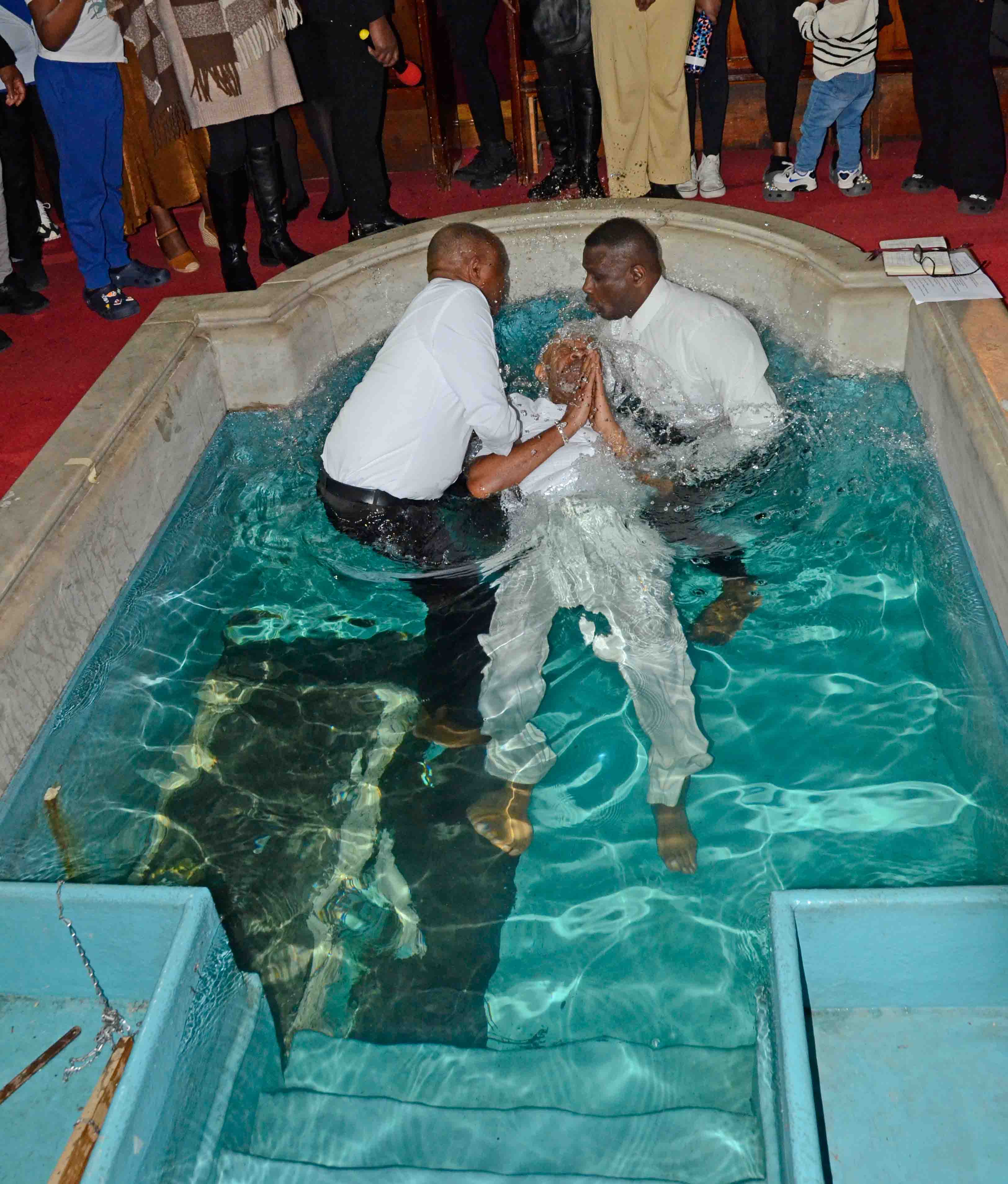 The act of baptism by full immersion