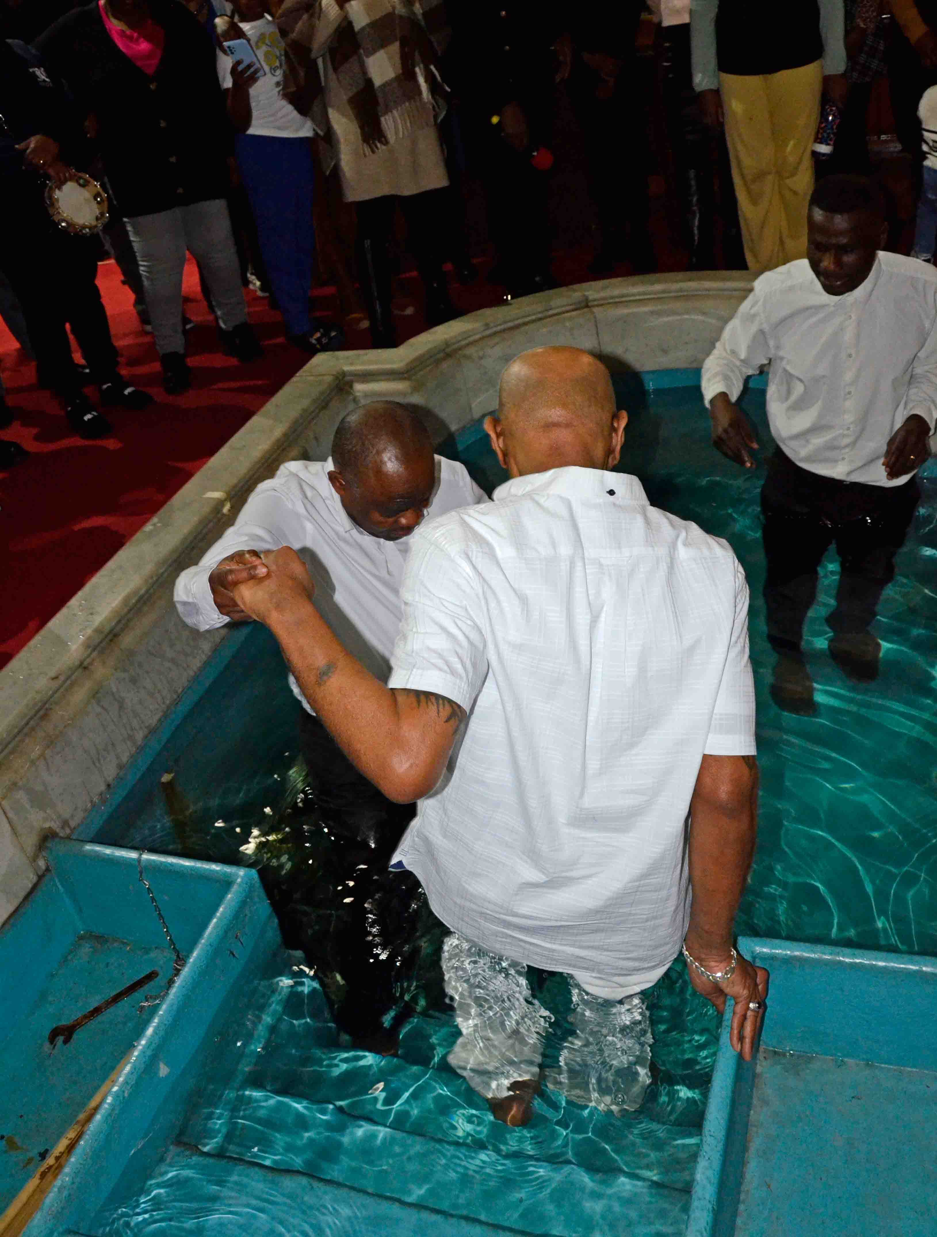 Witnesses watching the baptism
