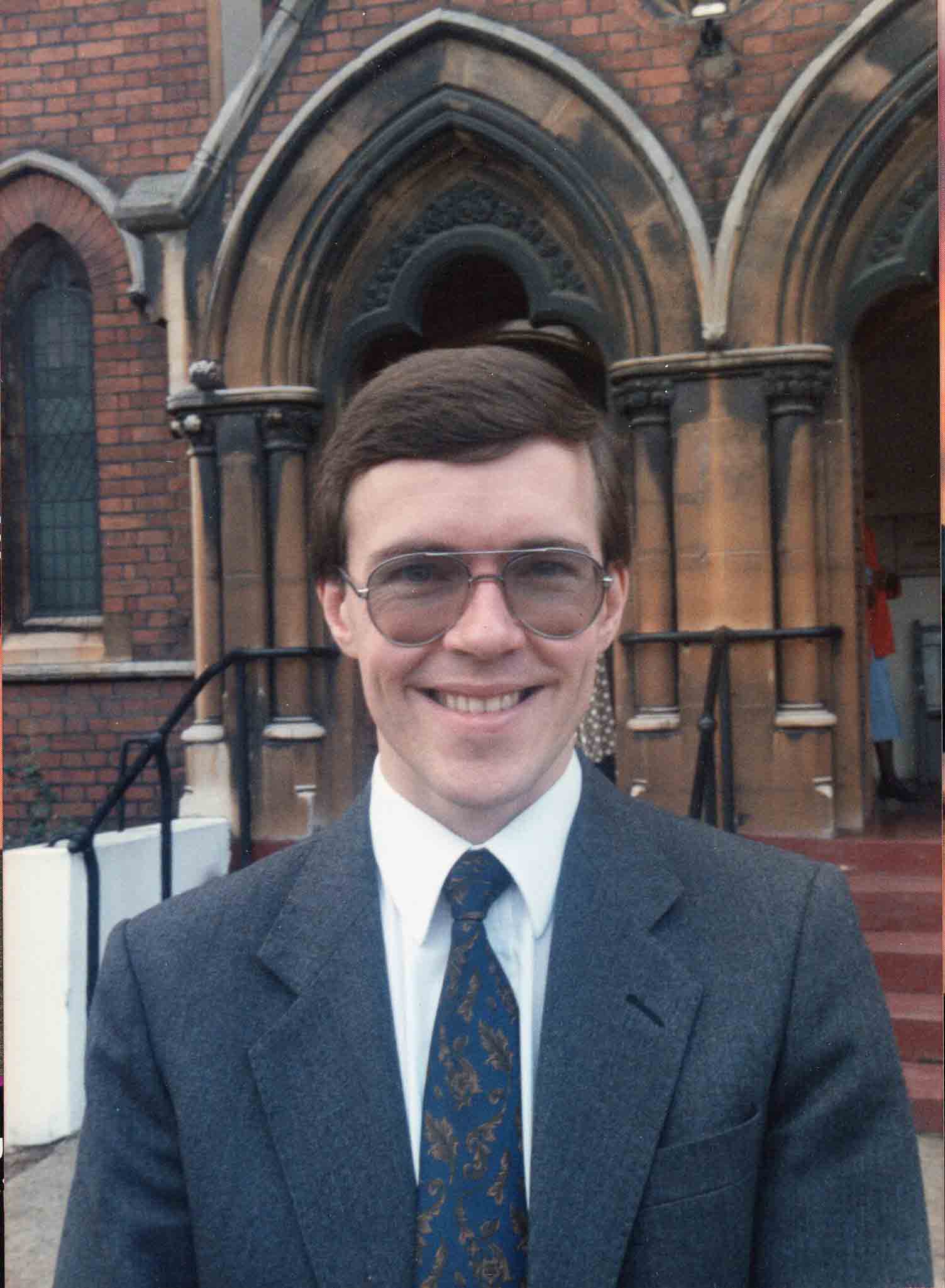 Rev. Eddie Larkman, minister from September 1986, photographed at the front of the church